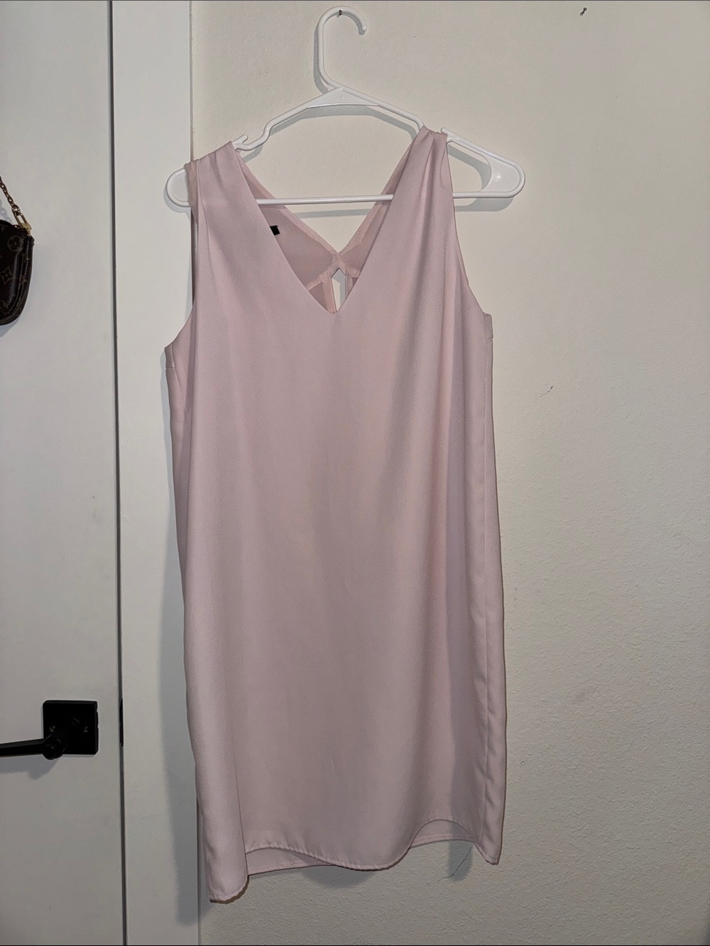 Sleeveless Light Pink V‑Neck Mini Dress with Back Strap Detail